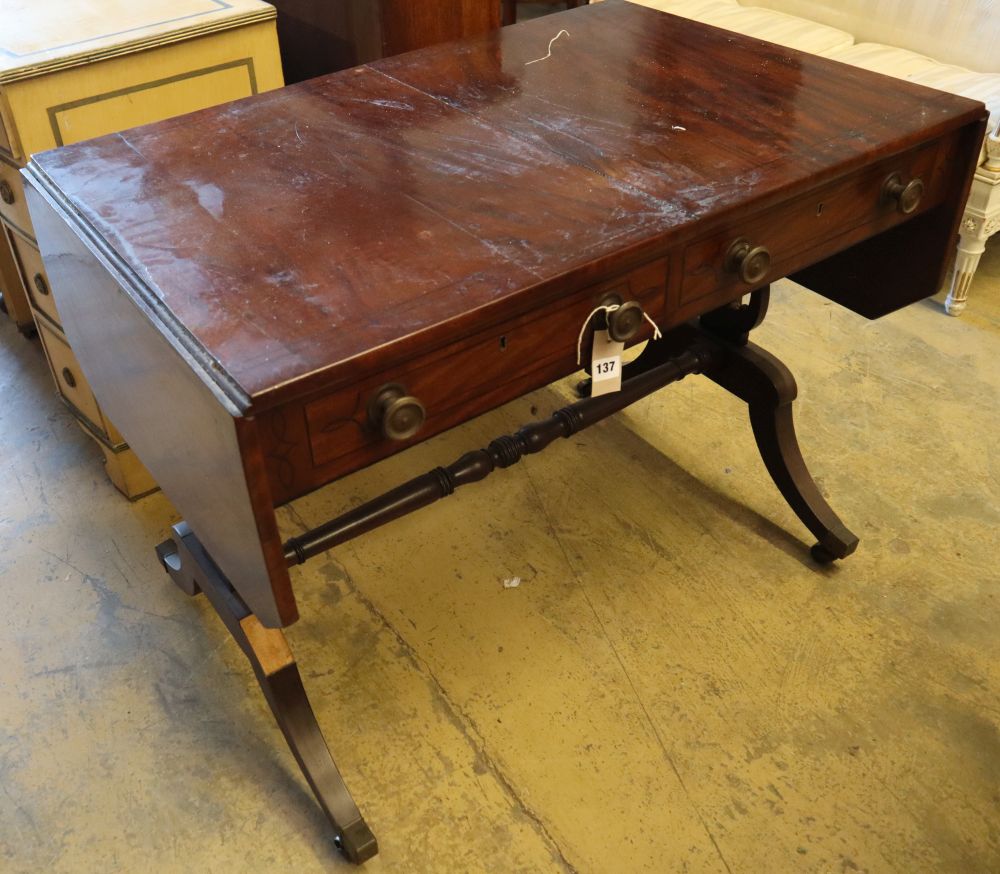 A Regency mahogany sofa table, with ebony stringing, and two frieze drawers, width 97cm